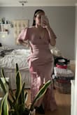 Hey yall,
This dress is soooo great! Sorry the pics suck but once I steam this beaut it will look even better :) I have a curvy body and have 34DD bust and this dress hugs everything in the right places. I never doubt a Lulus piece and can't wait to feel cute and fashionable at my friend's wedding this summer! - Kayla P.