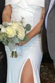 I bought this dress to wear for my small intimate wedding. I bought it on sale, so the price was perfect for my budget. The material is comfortable and has a little weight to it, which makes it feel a little formal. I used it as my wedding dress, but it can be used for other formal events. - Sylvia W.