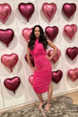 Fun dress that is super comfy! If you are big-chested, order a size up. (I ordered a backup medium and wore that, so the back laid more smoothly.) - Heidi C.