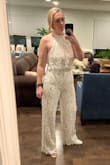 I didn't even end up wearing this jumpsuit but loved it so much that it was worth writing a review. I had this on hand in case I wanted to change for dancing, but it's an awesome fit, stretchy in all the right places, and beautiful detailing. - MEGHAN F.