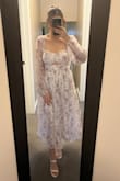 The dress is wonderful!!! Very flattering. It's good quality, no stretch at all (wish there was a bit), but rather very silky and soft on skin. No weird chaffing parts. Sleeves don't droop, they have a nice hold to them with a stretchy part. True to image presented online. Pure white with purpley-pink floral. Zipper is a bit of a pain in the butt/stubborn at waist seam, but not impossible. I ordered my usual size (medium) and I'm usually about 130lbs& However, I'm pushing almost 150lbs+ now and 5ish months pregnant, but it fits like a glove! I probably could have sized up and enjoyed it more while pregnant, but should be able to get lots of wear out of this ethereal dress even in the future! Just lovely!!! - Hayley L.