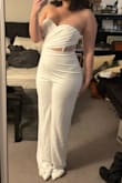 I love this jumpsuit SO much!! I got it for my rehearsal dinner (will be paired with the Gorgeous Poise 3D Floral jacket) and welcome party following. The legs are a touch long - I'll be getting them hemmed about an inch - but otherwise, I love how this jumpsuit fits my body. Many of them are for very straight/slender body types but this one compliments my curves really nicely. And the cutouts are so cute! - Emily P.