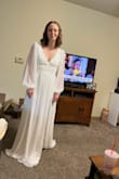 This dress was gorgeous, just a little tight. I'm definitely small-chested, but I have a wider ribcage and it was tight, not uncomfortably, but definitely snug. If you have a wider ribcage, just keep this into consideration, otherwise it was a really lovely dress! - Isabel B.