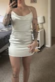 This dress is extremely sexy and fun. For me, I didn't want a tight / too short dress. Since it was more snug on my legs/butt than the model's, it is much shorter looking. I absolutely could've made it work, I just wasn't trying to be pulling it down all night while I was dancing/enjoying myself, so I went with something more whimsical and fun. If you are looking for sexy, this is it! - Katie S.