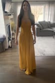 The quality of this dress is absolutely beautiful. I am bringing it with me to Italy! The fabric is soft, and the color is absolutely bright and beautiful to match the great scenery that I will be in when I go on my trip, I can't say enough, for the money this dress is absolutely beautiful. - Tiffanie N.