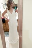 It's probably the dress I'm going to pick! The buttons down the back add a stunning touch! Very comfortable, too! It would be beautiful for a beach wedding! - Leslie D.