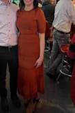 Perfect autumnal dress. The orange was a great color (I had ordered this in green as well and it didn't look as good in that color). Long midi length and I'm 5'5". I did size down to a XS so the arms were a little tight but I usually wear a S. I could have worn either size but wanted the waist to be more fitted. The slip made it opaque enough so it wasn't see through. - Hope P.