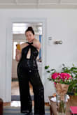 This was fun and surprisingly comfortable, but looked less formal on me than on the model. The front cut out hit me weirdly also - I'm short-waisted, so it may have hit a little too wide/low to be flattering. I like the back a lot. True to size. Obviously, you can't wear a normal bra with it, I went braless. - Amanda W.