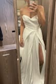Beautiful beautiful beautiful! I haven't worn the dress yet as my wedding day is only in July but I have tried it on twice and it fits so so well. It's nice and long so if you are taller you will be fine, I might have it shortened if I have time, otherwise, I'm going to rock the length. The material is gorgeous and the quality is absolutely stunning. Very happy with my dress and the price too. It came very quickly as well. The slit does come up quite high but you can very easily pin it or stitch it. - Melissa S.