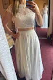 I love this two-piece wedding dress! I decided to add a tulle overlay to make the skirt a bit fancier, otherwise it's perfect! I can't wait to wear it for my beach wedding. :) - Amy R.