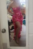 Super pretty dress for Prom. I love it. It was actually everything I was looking for this year. The tiers, a little glitter/sequin action, hot pink,  and strapless. I did have to exchange the medium for a small. I'm usually a medium in most things, but I recommend sizing down so it stays up. The size small came within a week! - Camdyn M.