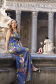 I purchased this dress for a romantic photoshoot in Italy, and it was just perfect. Great quality and beautiful dress. Was pleasantly surprised at the quality. It was a little large. I ordered a medium at first and then had to order a small. Small fit well, so I think they run big. - Shptime J.