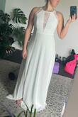 The medium was too large. The small fit nice everywhere, but the chest was still too large. Even with my largest bra on, it didn't fit. I understand I could have had it altered, but I felt the material was a bit thin. It would not have been an easy alteration. Gorgeous dress though. I honestly really wanted this one. Wish my girls were bigger, might be good if you're a larger b or higher cup size. - Nichole S.