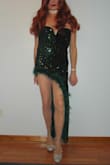 Haven't been to any formal events in a long time so, wanted to try something unique for the one coming up. This item seems like it will be perfect. Not a lot of sequins came off during my trial fitting and just a few small feathers were left in my wake. Looking forward to the event and really excited to wear this out. - Gretchen M.