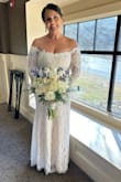 Dress was stunning absolutely was perfect for our small intimate wedding. Sleeves were a little small and hard to lift my arms in. My only issue was the zipper it took three people to get it to zip, it kept getting stuck, I did read the reviews beforehand so I had pins ready in case it ripped but thankfully it didn't. I had a sparkle belt added for some bling. - Jennie V.