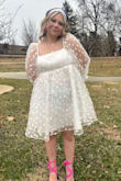 Hi just letting you guys know Lauren's dress was really really pretty true to the photo. She was super happy with it as well. The shoulders were a little loose but with a few stitches it was perfect. I was happy with the notice I received that the dress was in stock originally it was going to be a month out but you guys delivered. Thank you Rachelle - Rachelle L.