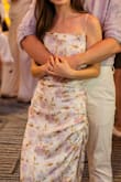 This dress is absolutely gorgeous! It fits true to size and it's very flattering. I received so many compliments during my engagement shoot. The material is very comfortable and the colors of the dress feel reminiscent of a French garden. - Sabrina D.