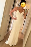 Feeling of Forever White Sleeveless Mermaid Maxi Dress size M.
I am 5'11" and about 150 lbs wearing 7cm heels in the picture.
The fabric is thick and snug which creates a nice silhouette. It is not sheer and looks very good quality for the price point. Did not iron it yet on the picture. I am always between 2 sizes M and L. I've ordered both sizes and plan to go with the M as pictured. I have been shopping around for wedding gowns at very much higher price point and for the price difference, I don't see so much difference in the look and the quality than with this one. I prefer to save my money and go with Lulus then! - Aurel H.