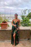 I had this dress in my saved items in case of a restock and was not disappointed. The material is silky and the dress fit perfectly. The top provided enough coverage for a family wedding. - Sabrina B.