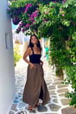 This skirt fit great! The buttons make it easy to customize the slit on the dress! Also, it has pockets! - Sabrina B.