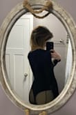 Perfect! But I wish the arms were an inch or two longer. It rides up to under my wrist but super stretchy. Didn't shrink, the buttons at the bottom are comfortable. Size sm. - Sarah S.