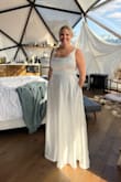 The fit was amazing, I couldn't have been any larger though to fit in this.  I maxed it out!  At 5'11, the length was perfect too. I bought it as a last-minute purchase two weeks before my elopement and it was perfection!  Thank you!  The pockets too were perfectly me. The satin was great and wrinkles steamed out easily. Reading all the reviews helped me feel like this would be the dress for me and it was. - Erika B.