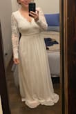 I bought this dress in a small I have an athletic build with a big booty and it fits great except it's a bit long. The material feels good not itchy or cheap feeling  I can not wait to wear it on my wedding day! - Allison D.