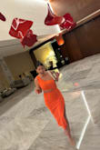 Love this dress. Perfect for vacation and the orange looks amazing with a good tan! - Kelley C.