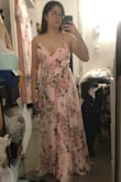 I've been wanting a nice floral chiffon maxi dress for a while, and this one was really lovely so I bought it. I wish it was a bit more blush pink vs light pink but it's still very lovely. The floral pattern is gorgeous. Wrap dresses are always a little tricky, and this one is made more tricky by the overlaying straps in the back, but once you figure it out, it looks great. It is long (I'm 5'3'') but 3 or higher inched-heels would probably be enough for the fabric to not drag on the floor. That being said, you may still need to alter it depending on the occasion. The cut was initially pretty low at first but I was able to adjust the straps so that it didn't sit so low on my chest anymore. I'm pretty small on top, so this worked for me. - Nancy C.