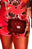 This was the perfect vacation purse. It was large enough to fit my passport, wallet, and phone. With the gold chain and leather look straps, the purse was versatile enough to wear during the day with casual outfits and at night when I was a little more dressy. It was a great purchase. - Cheryl S.