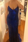 I love the details on it, as well as the color. I'm obsessed with the back as well! My only complaint is that it is a few inches too long but a pair of 4-inch heels (or tailoring it) would make it perfect! It would probably be a perfect fit for someone 5'8"! - Eve L.