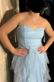 This dress is unique and beautiful! It's very elegant and flowing. If you're smaller on top, then it may slide down. So my daughter is not sure if this dress will be the best choice due to her smaller bust. - Jennifer M.