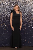 This dress was perfect for a formal fundraising gala. I received so many compliments on the one shoulder ruffle and the mermaid fit. It was easy to move in as well. Totally a steal for this type of dress at this price. - Summer K.