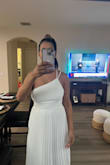 This dress fit perfect. I'm not curvy but it shaped my body. Fabric is great quality and flowy. - Sofia B.