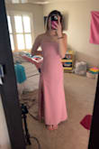 the top of the dress is a little tight, but other than that, it's beautiful! - Lilly H.