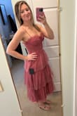 This dress is so pretty in person. Great details. I wear a size 6, and the small fits snugly which is what I wanted. I also purchased the medium but it wasn't as fitted as I'd like. - Jamie B.