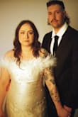 I love this dress! I wound up buying and adding more feathers to it and I'm glad I did! I got a ton of compliments on it as well and I think I only lost 1 rhinestone on the back side. :) - Courtney V.