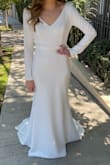 Beautiful dress! I loved it. Got so many compliments. However, I got it tailored as the sleeves were too long, as well as the dress itself (didn't wear high heels). I also added a small hook to pick up the train. So classy, elegant, and simple. Gorgeous dress! - Ruth R.