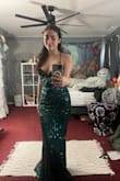 I got this dress a little early for prom, and I am so excited to wear it, it fits so comfortably and perfectly, I got it in a xs and it's a little long but with heels on it'll be the perfect length. The designs of the dress make it stand out so much. It looks even better in person!!! - Joy F.
