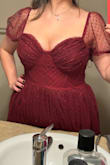 It's a pretty dress but the fabric that makes it fluffy was not a good quality. Made my body itch. Also, it is not a good fit if you have bigger breasts. You may see this in the photo. Also, I am unhappy with the return policy. I had to pay $26 to send it back. - Zarnigor U.