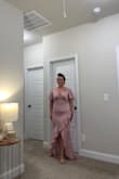 Bought this silk dress to wear at my son's wedding. While there is no stretch the sizing is accurate it is just a smidge tight but that is do to me gaining weight. I'm 5'3" 167 pounds and I'm very curvy, need to lose a few pounds and it will be perfect. I am surprised with the length as usually Lulus dresses are too long for me but this fit perfectly with heels. It's classy with a little bit of va va voom! It does show every curve and imperfections. I did have seamless boy shorts on but since the dress is silky it tends to slide up a bit (in the area only) with the seamless boy shorts on, still trying to work out how to keep dress from riding up (maybe hairspray). Good thing is you can wear a regular bra. Love the mermaid tail not too long and of course this is straight out of the package. Hope this helps! - Tracy H.