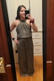 I normally wear a small/medium but this definitely runs big so size down. Material is stretchy and roomy enough. XS fit me perfectly. Bought this for a 70s disco themed party and it super cute! - Valerie C.