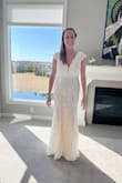 This is a beautiful dress. I tried on others that cost hundreds and even thousands, and I wound up deciding to wear this one for my wedding. The quality is surprisingly good! - Natalie H.