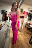I always fear jumpsuits being too short because I'm on the taller side, but this one is the perfect length!! I was smack dab in between an S and M, per usual. I went with an S and it fits like a glove but if you have a booty like me it'll be tight. - Emily L.