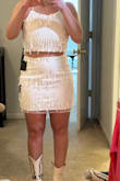 I LOVE this outfit. It's fun and springy And perfect For my bachelorette. The only downside for me was the top, it's so hard to get on! I had to have help each time trying to figure out how to put it on with all the laces and then Needed help from someone to adjust the top. Overall love but wish it was easier to throw on! - Lanie M.