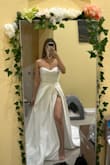 Amazing quality and fit super well! Has a nice train, thick, and enough fabric to sew down the leg slit if u want it lower. I've been dreaming of a dress like this but didn't want to pay $1K + and this dress is a dream! I am in between sizes 2 and 4 but 4 was a little loose around my 25.5-26 in waist and the cups were loose as well for my 32C breast. I kept the 2 bc I didn't want to pay too much for alterations. - Elena D.