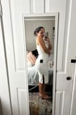 I am so happy with the way this dress fits. I got it for graduation in May and I am so excited to wear it! The fabric is thick enough but also has so much stretch to it. So happy with this purchase! - Ariana