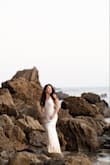 I was inspired by Carolyn Bessette-Kennedy's wedding look. I wanted a timeless and forever look that I could look back on for years to come and still love it. This dress was a dream come true the moment it arrived in the mail. I put it on, and I felt like a million bucks. The material is high quality soft and comfortable prepared to feel like a goddess. The way it reflects in the light is the perfect soft, creamy white. It was so comfortable throughout the day. I'm curvy and only 5'2; the length was perfect with just enough train, I felt it hugged my curves just enough and left me room to breathe and eat. If you're thinking about it, I promise you this is it!! You're never going to want to take it off; it really is the dress of your dreams come true. I'm so grateful to Lulus for making my bridal dream into a reality! - Jessica G.