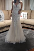 I wanted something classic, fun and laidback. I was positively surprised with the quality that I got for the price I paid. The fit is really good! I'll probably do a bit of alteration just to improve the fit, but really thank you for this wedding design! I love it!! - Robe P.