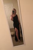 This dress slipped on like a glove! It was beautiful. It is a little long for my shorter stature, but with heels it is fine. The slit is so tasteful but also very flattering. This dress is amazing! - Marley M.